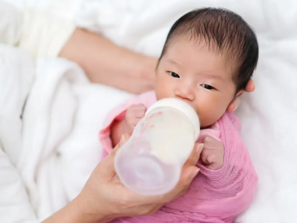 Bottle feeding newborn, part of newborn feeding guidance and tips